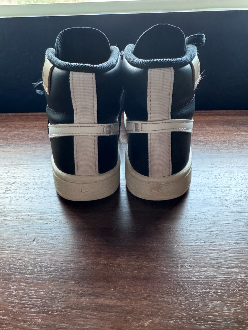 Nike Black High-Top Sneakers with White Swoosh and Cream Heel Tab - Picture 2 of 4